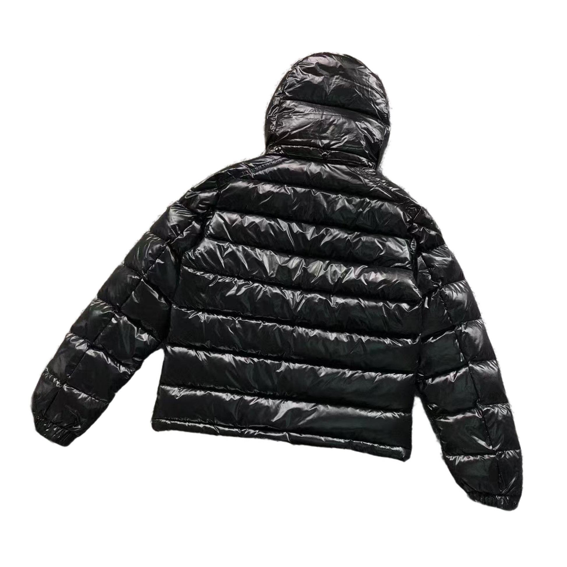 Black puffer jacket on a white background